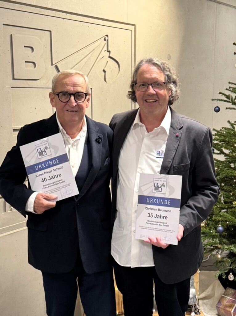 Besondere Jubiläen: Klaus-Dieter Schmitt 40 Jahre, Christian Baumann 35 Jahre bei Brandel-Bau